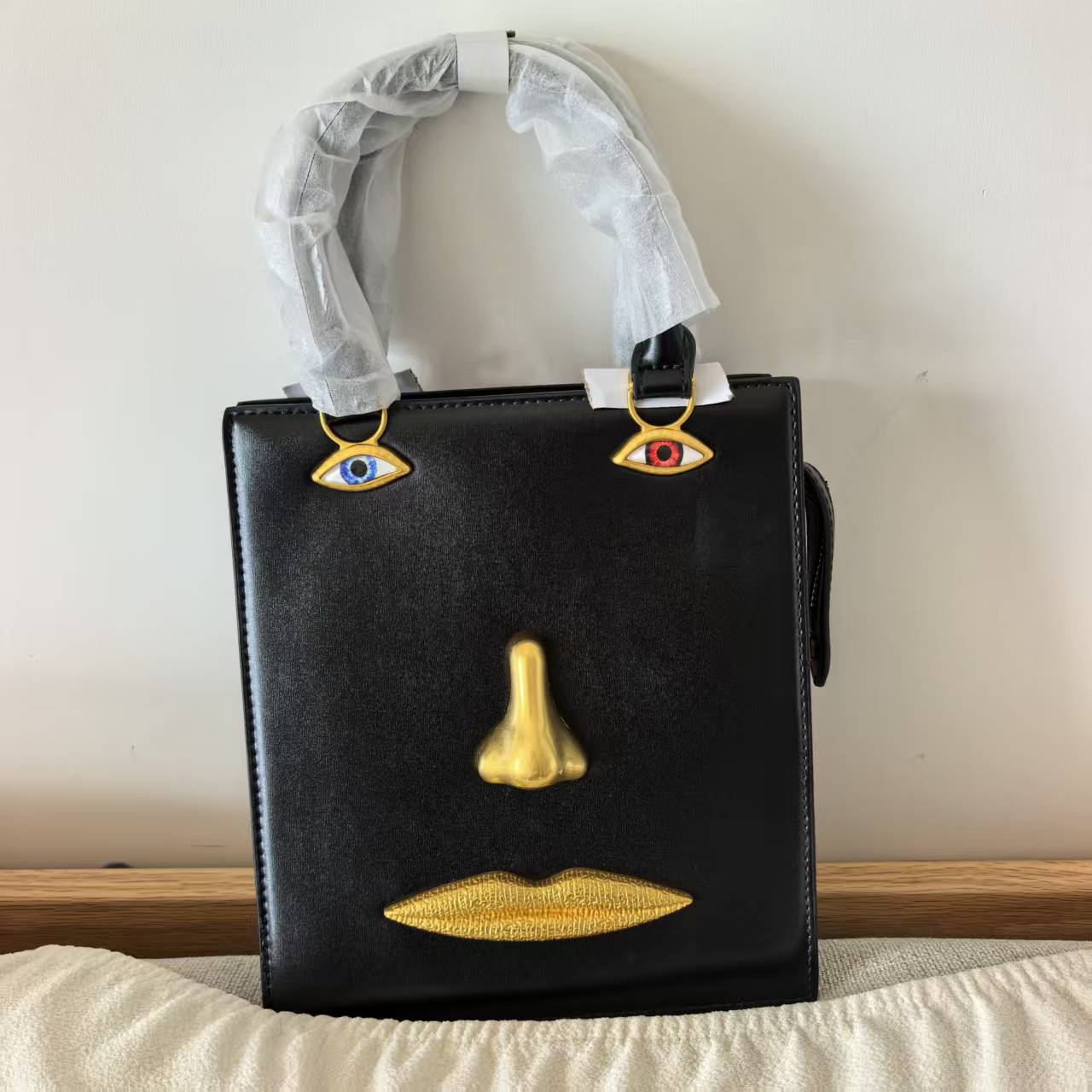 Luxury Designer Human Face Pat - đánh giá và giá Luxury Bags To Sell